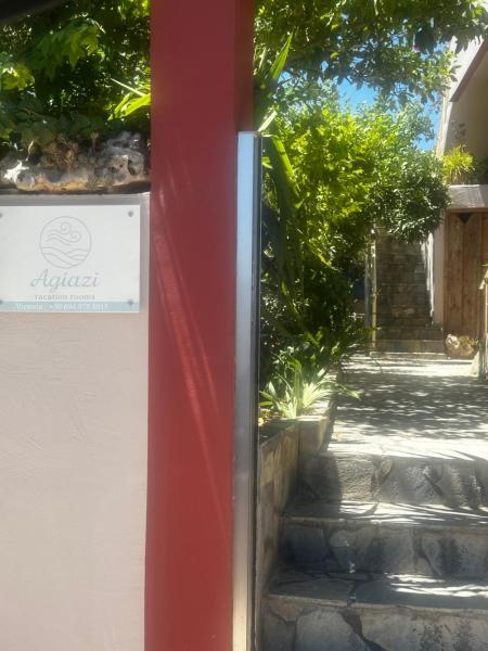 The photo shows the Agiazi Vacation Rooms Pitsidia located in the city of Pitsidia.