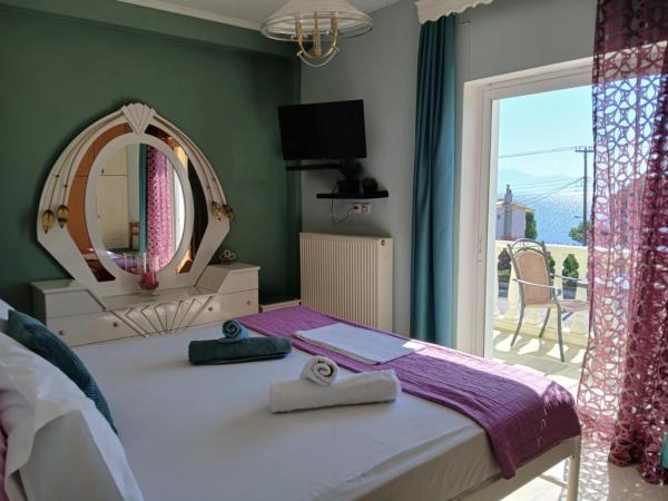 La photo montre l'objet Helen's Seaside Apartment situé dans la ville de Platanítis.