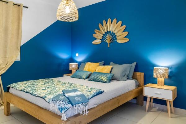 A la foto es mostra l'objecte Mango! Vue lagon et Sunset Appart duplex 6 à 7p tout neuf situat a la ciutat de Marigot.