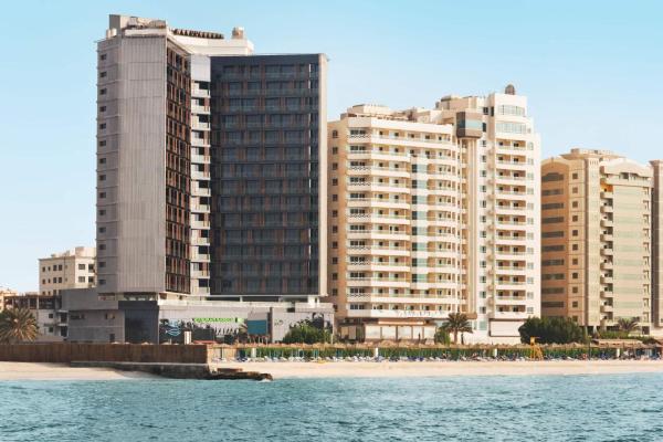 The photo shows the Wyndham Garden Ajman Corniche located in the city of Ajman .