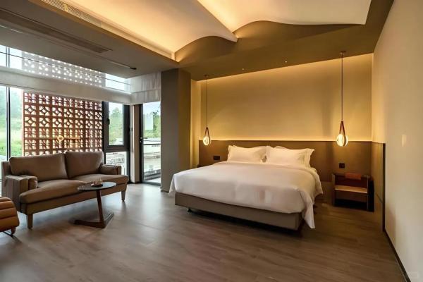 Op de foto is het object Guanlu Art Hotel te zien, gelegen in de stad Xingrenbi.