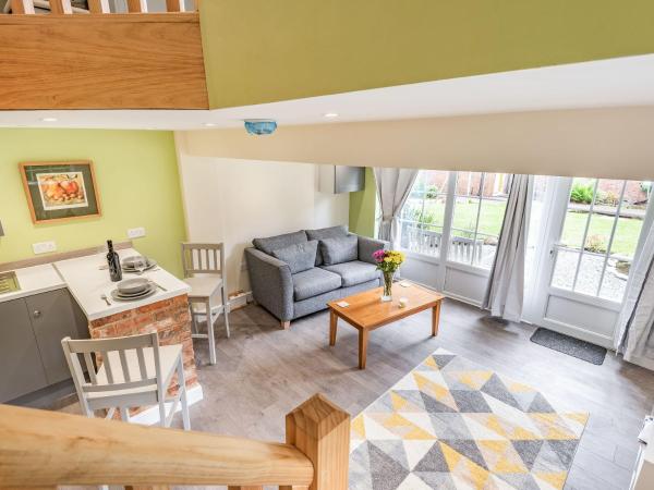 A la foto es mostra l'objecte Owl Cottage situat a la ciutat de Howell.