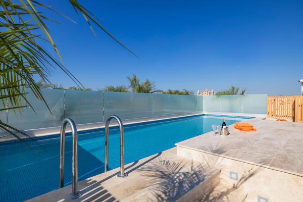 På billedet ses objektet Salmar Court Holiday Apartments with Pool by Buena Vista beliggende i byen Għaxaq.