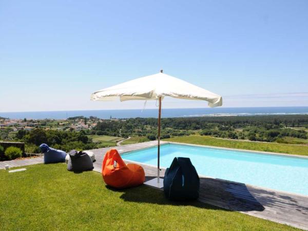 Na zdjęciu widoczny jest obiekt Stunning Caminha Villa 3 Bedrooms Villa Gagusta Beautiful Sea & Beach Views Great Pool Area położony w mieście Cristelo.