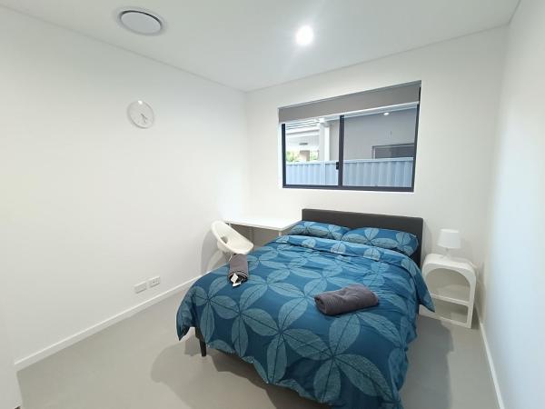 A la foto es mostra l'objecte Cozy Double Room in Modern House - NR6 situat a la ciutat de Guildford.