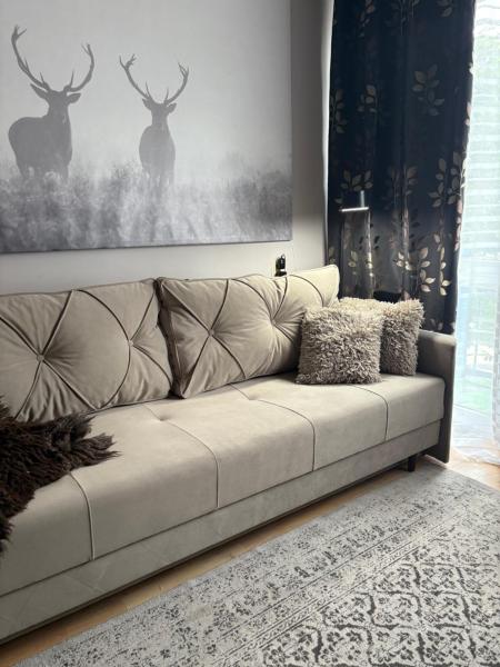 Na zdjęciu widoczny jest obiekt Przytulny Apartament położony w mieście Chmielów.