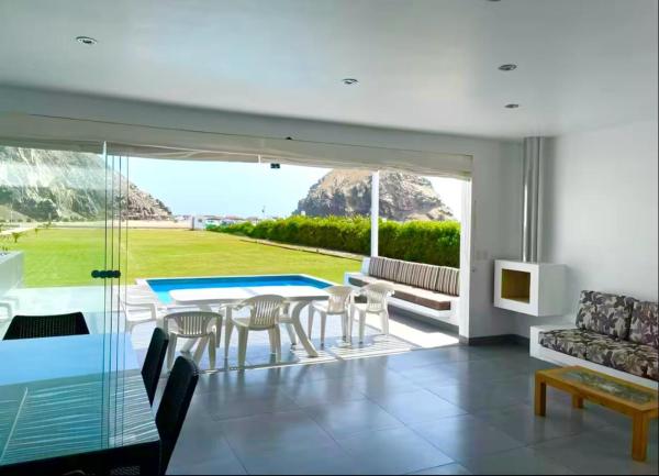 A la foto es mostra l'objecte Casa de Playa frente al mar en Chocalla, Asia situat a la ciutat de Fundo Copacabana.