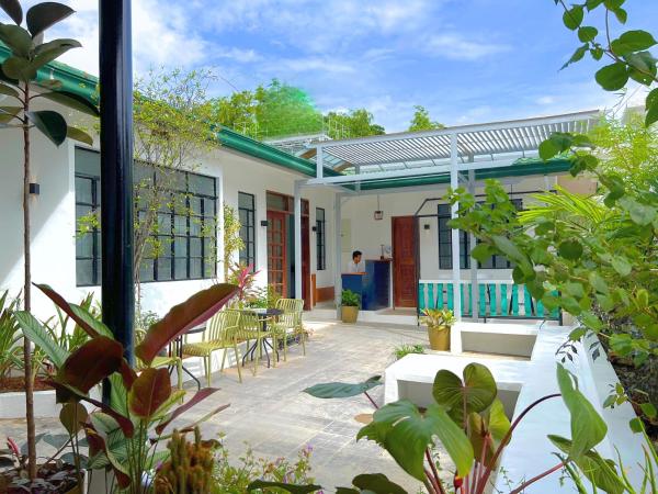 写真にはコロン市にあるA Casa Portuguesa Coron Boutique Hostelが写っています。