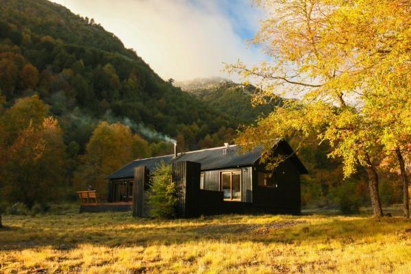 A la foto es mostra l'objecte Casa Las Raíces - Relajo con tinaja y vista al volcán, a minutos de Corralco situat a la ciutat de Malalcahuello.