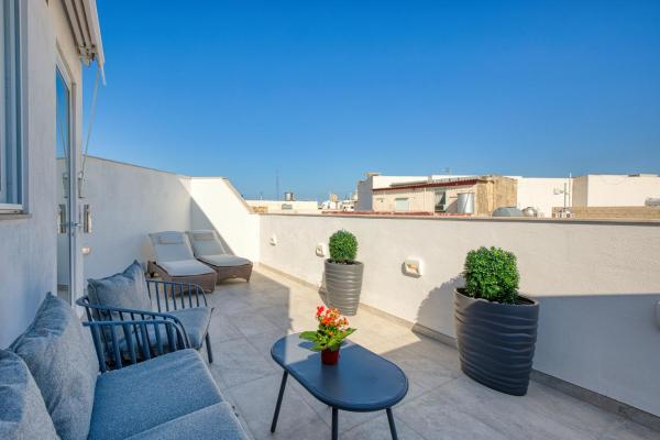 A la foto es mostra l'objecte St Venera Penthouse 2 Balconies Big Screen TV situat a la ciutat de Santa Venera.