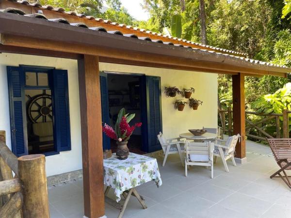 A la foto es mostra l'objecte Natureza e Mar- Casa com Píer situat a la ciutat de Cambaquara.