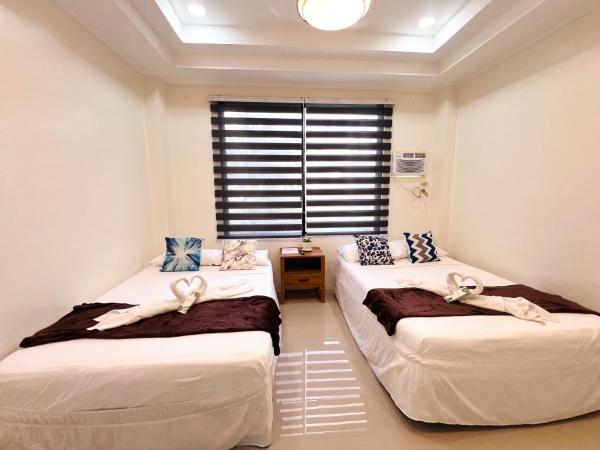 På billedet ses objektet Taylors Plantacion Resort- Grande Superior Room beliggende i byen Catarman.