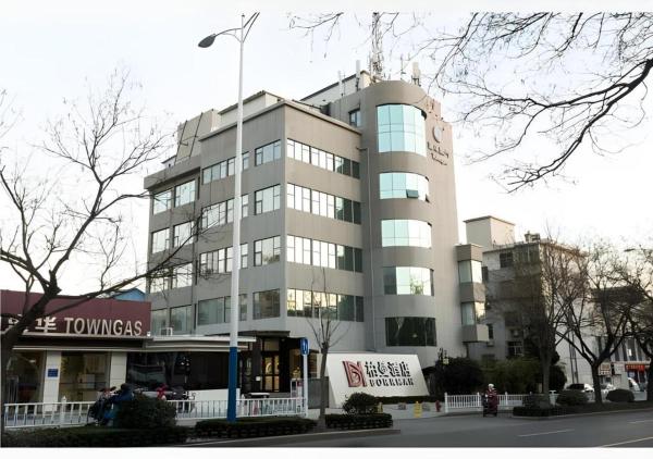 På bildet vises objektet Borrman Hotel Tai'an Central Hospital Taishan Tianwai Village Hongmen som ligger i byen Tai'an.