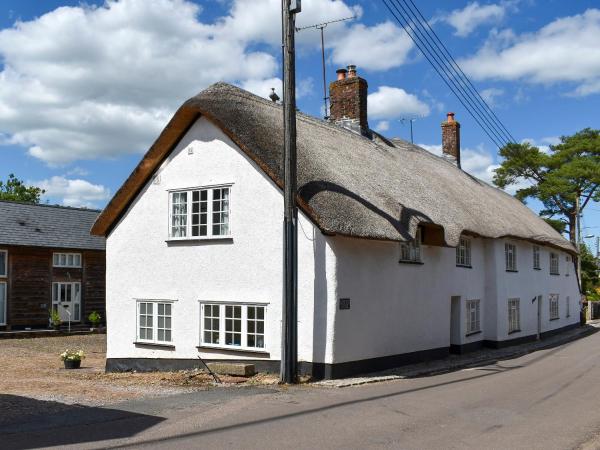 A la foto es mostra l'objecte Glimsters Cottage situat a la ciutat de Willand.