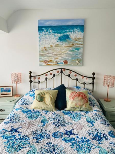 Na fotografii je vidět objekt SeaShells Luxury Seaside Holiday Home nacházející se ve městě Marton.
