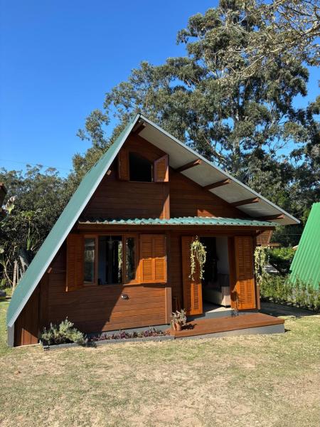 På billedet ses objektet Cabana Moçambique, AC, vaga e trilha para praia! beliggende i byen Florianópolis.