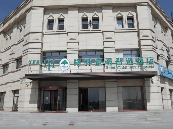 The photo shows the Green Tree Inn Express Inner Mongolia Ulan Qab High-Speed Railway Station located in the city of Ulanqab.