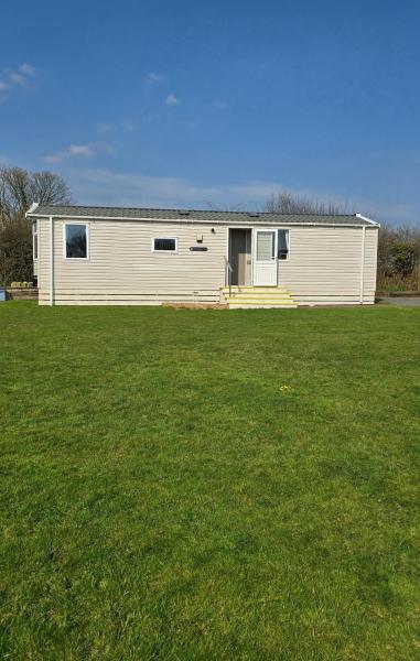 A la foto es mostra l'objecte The Caravan situat a la ciutat de Anglesey.