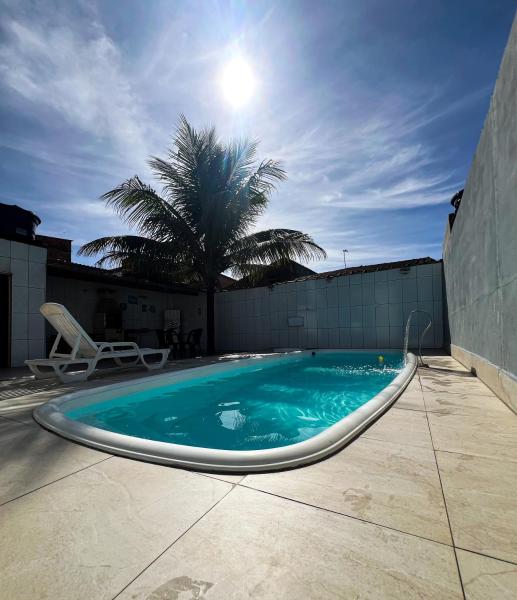 A la foto es mostra l'objecte Casa Com Piscina - Mongaguá - Hidro - Wi-Fi - Piscina Grande situat a la ciutat de Mongaguá.