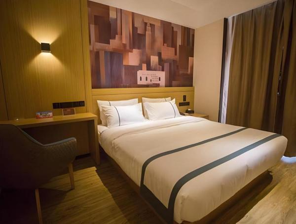 Na zdjęciu widoczny jest obiekt City Comfort Inn Laibin Wuxuan Yuda położony w mieście Xiangzhou.