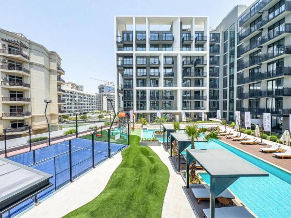 A la foto es mostra l'objecte Modern Studio - Pool, Gym & Padel situat a la ciutat de Dubai.