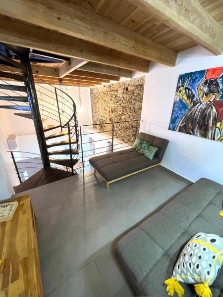 A la foto es mostra l'objecte Maison de village situat a la ciutat de Barbaggio.