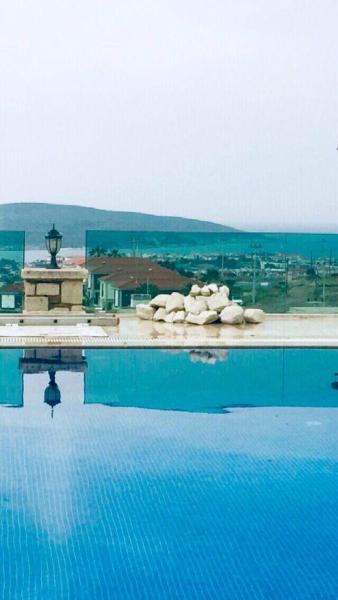 En la foto se muestra el objeto Çeşme Alacatı Müstakil Havuzlu Villa ubicado en la ciudad de Reisdere.