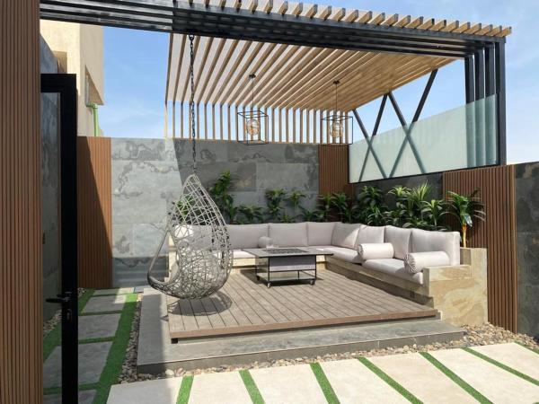 A la foto es mostra l'objecte شقة 10 بحي النخيل مع سطح - دخول ذاتي situat a la ciutat de Riad.