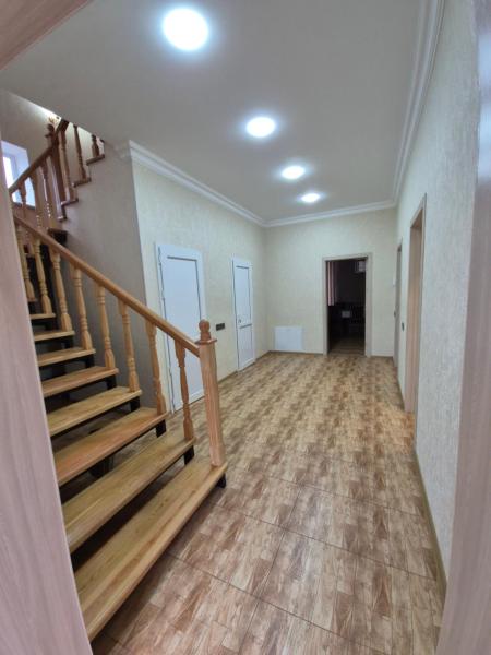 Na fotografii je vidět objekt Olimpus1 nacházející se ve městě Hǝsǝnqala.