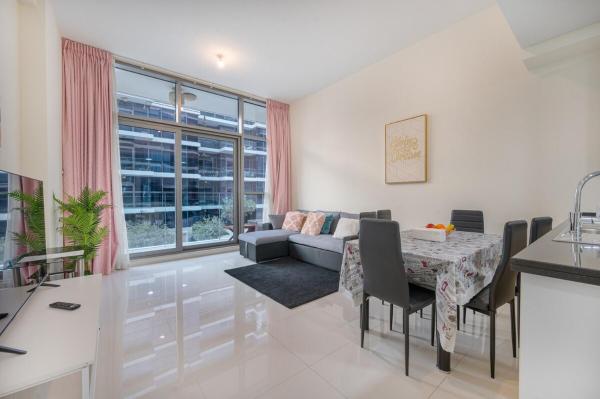 A la foto es mostra l'objecte 1BHK Retreat Peaceful & Bright situat a la ciutat de Dubai.