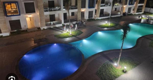 Complex gardenia martil con piscina y garaje 2 habitaciones y terraza vista a la piscina, Martil