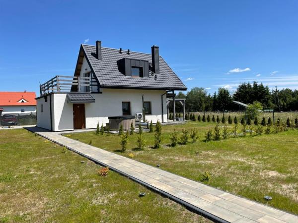 På bildet vises objektet Domek letniskowy nr 1, 13-100 Jabłonka 54c som ligger i byen Natać Wielka.
