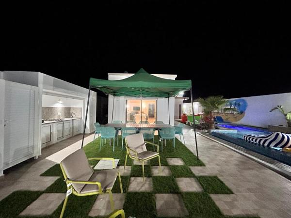 Nella foto è visibile l'oggetto Villa SUN SQUARE DJERBA situato nella città di Awlād ‘Umar.