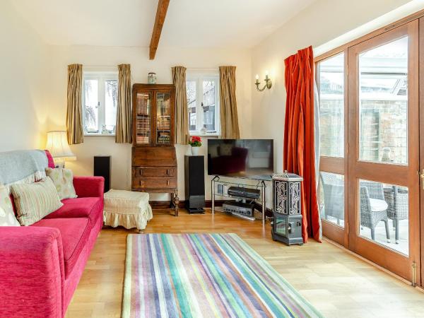 A la foto es mostra l'objecte The Coach House situat a la ciutat de Mersham.