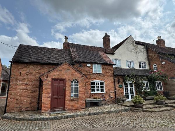 A la foto es mostra l'objecte The Farmhouse at Nettle Hill situat a la ciutat de Ansty.