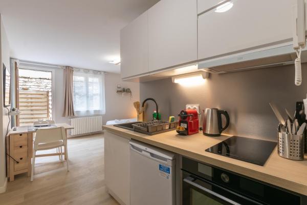A la foto es mostra l'objecte Appart'Hotel Tournusien situat a la ciutat de Tournus.