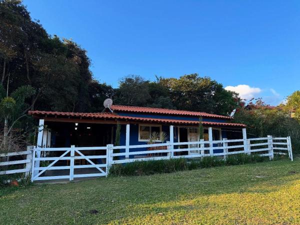 La photo montre l'objet Casa Azul - Cachoeira da Zilda situé dans la ville de Carrancas.