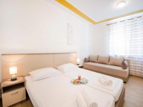 The photo shows the Guest House Mia ST - Standard Studio A1 located in the city of Split.