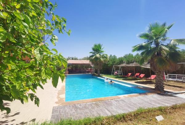 På billedet ses objektet Dreamy Stay in Ourika NOVA Pool Villa with Atlas Backdrop beliggende i byen Amekhlig.