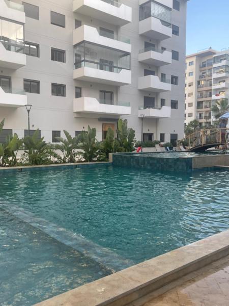Ocean park , for married couples and families only , Luxury fully furnished one bedroom flat next to zenata beach with five avialable swimming pool at the compound, Касабланка