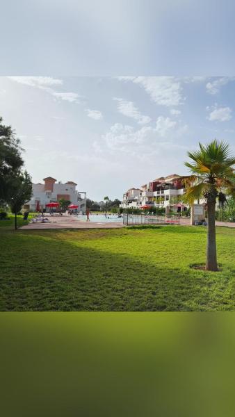 Nella foto è visibile l'oggetto Appartement au RDC paisible avec jardin privé et accés piscine situato nella città di Saïdia.