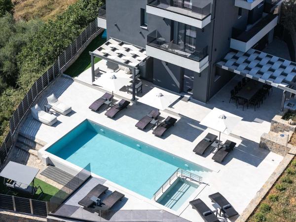 Auf dem Foto ist das Objekt Heliodora Villa, Premium Nature Living, By ThinkVilla in der Stadt Avdhellás zu sehen.