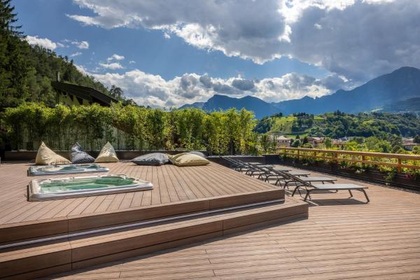 A la foto es mostra l'objecte Alchimia WellResort situat a la ciutat de Comano.