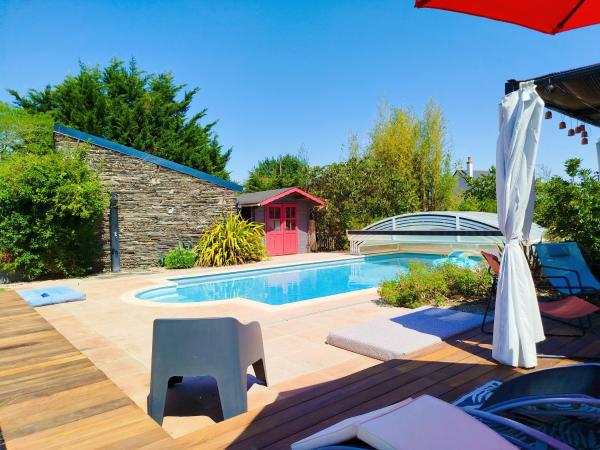Nella foto è visibile l'oggetto Logement Aubance dans charmante longère avec piscine en partage situato nella città di Juigné-sur-Loire.