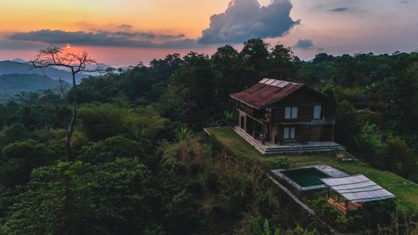 A la foto es mostra l'objecte Master bed room in Bukit Cottage situat a la ciutat de Limbung.