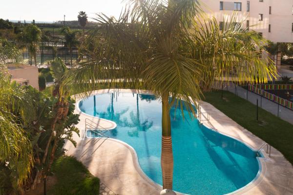 På billedet ses objektet Beautiful apartment with pool and gardens beliggende i byen Torre del Mar.