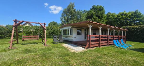 Na zdjęciu widoczny jest obiekt Domki pod Gruszą położony w mieście Mącze.