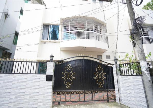 The photo shows the Alom Manzil - 4 Bedroom Family Home located in the city of Sylhet.