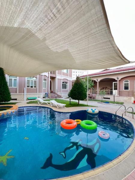 Na fotografii je vidět objekt MIMFRI PREMIUM guest house, hotel nacházející se ve městě Taškent.