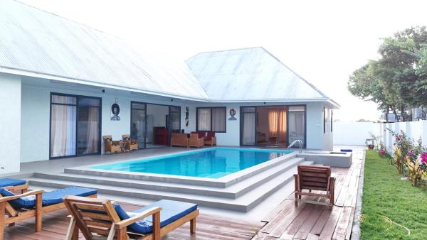A la foto es mostra l'objecte MG Villa, Zanzibar situat a la ciutat de Mfumbwi.
